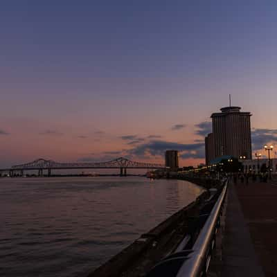 View of Crescent City Connection bridge from Woldenberg Park, USA