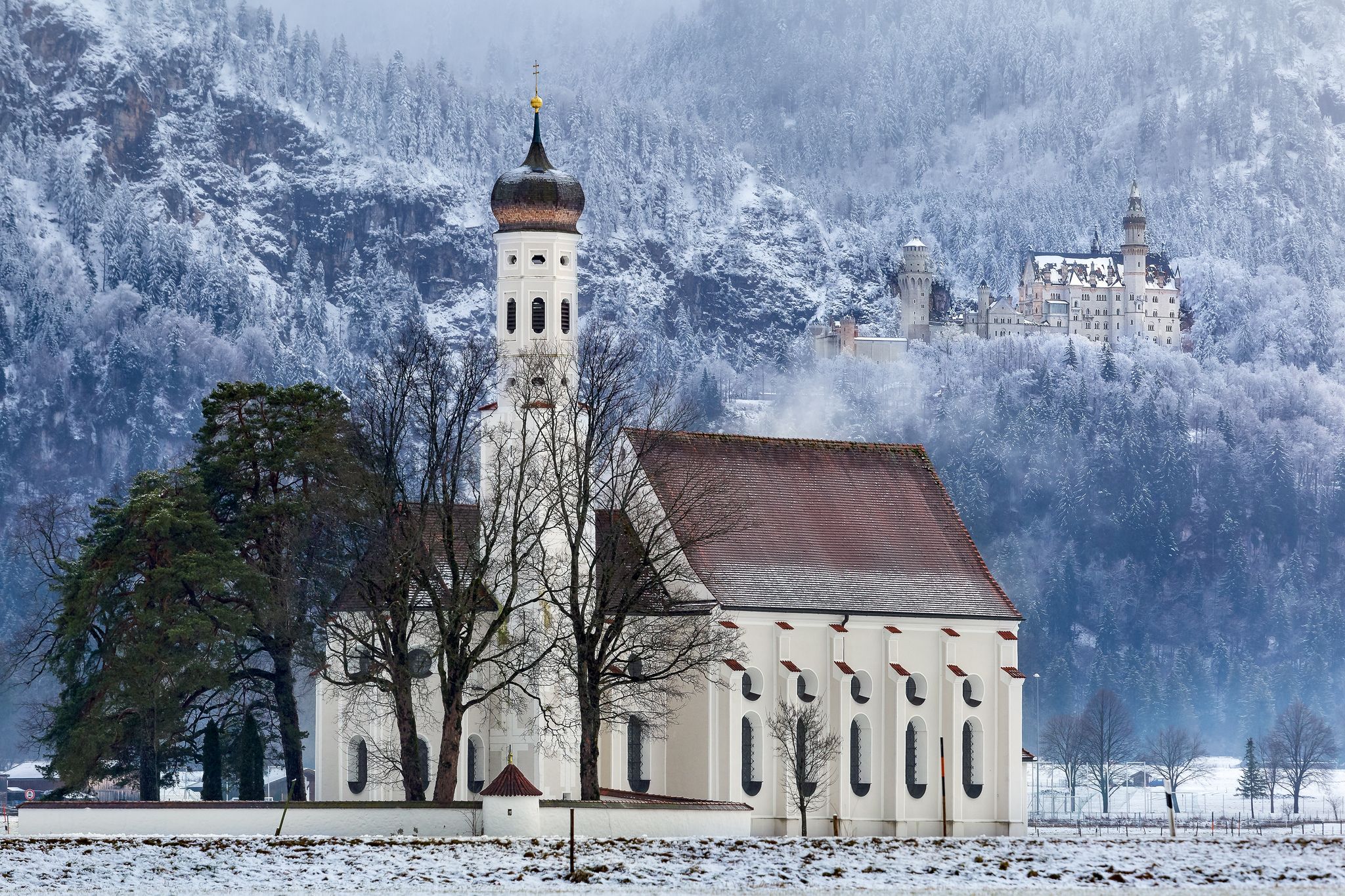 St. Coloman Church with Neuschwanstein, Bavaria, Germany