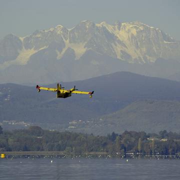 Canadair in action in front of Monte Rosa, Italy