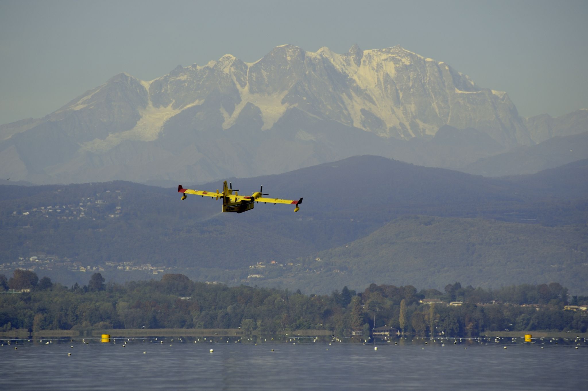 Canadair in action in front of Monte Rosa, Italy