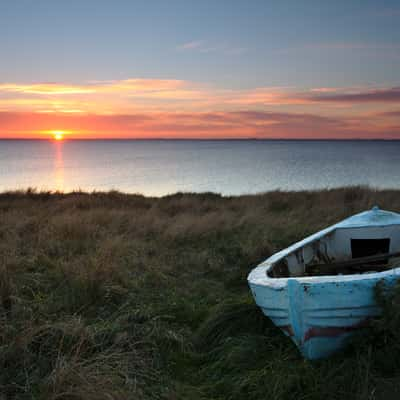 Old boat at the shore close to Ejsingholm, Denmark, Denmark