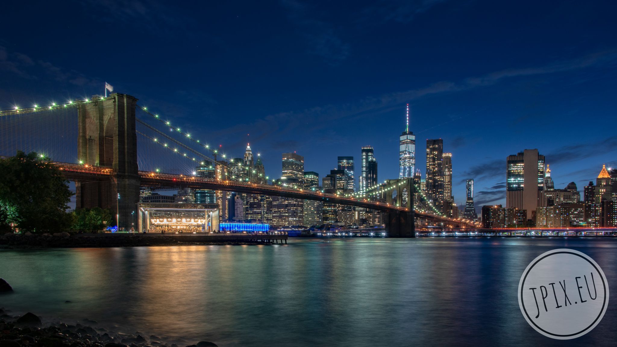 Brooklyn Bridge skyline from Pebble Beach, New York City, USA