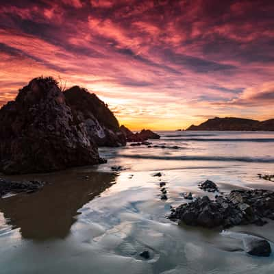 Looking back to Nugget Point at sunrise, New Zealand