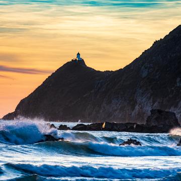 Nugget Point Lighthouse sunrise, New Zealand