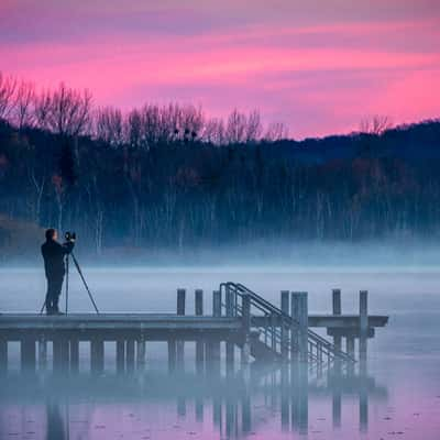 Photographer on the jetty, Germany