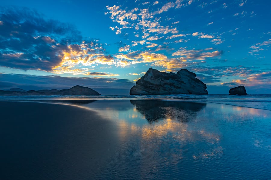 Wharariki Beach sunset Takaka South Island, New Zealand