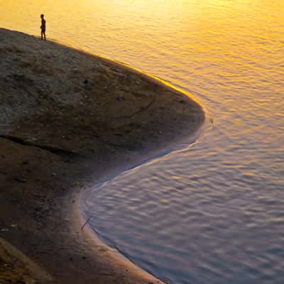 Climbing the riverside, Myanmar