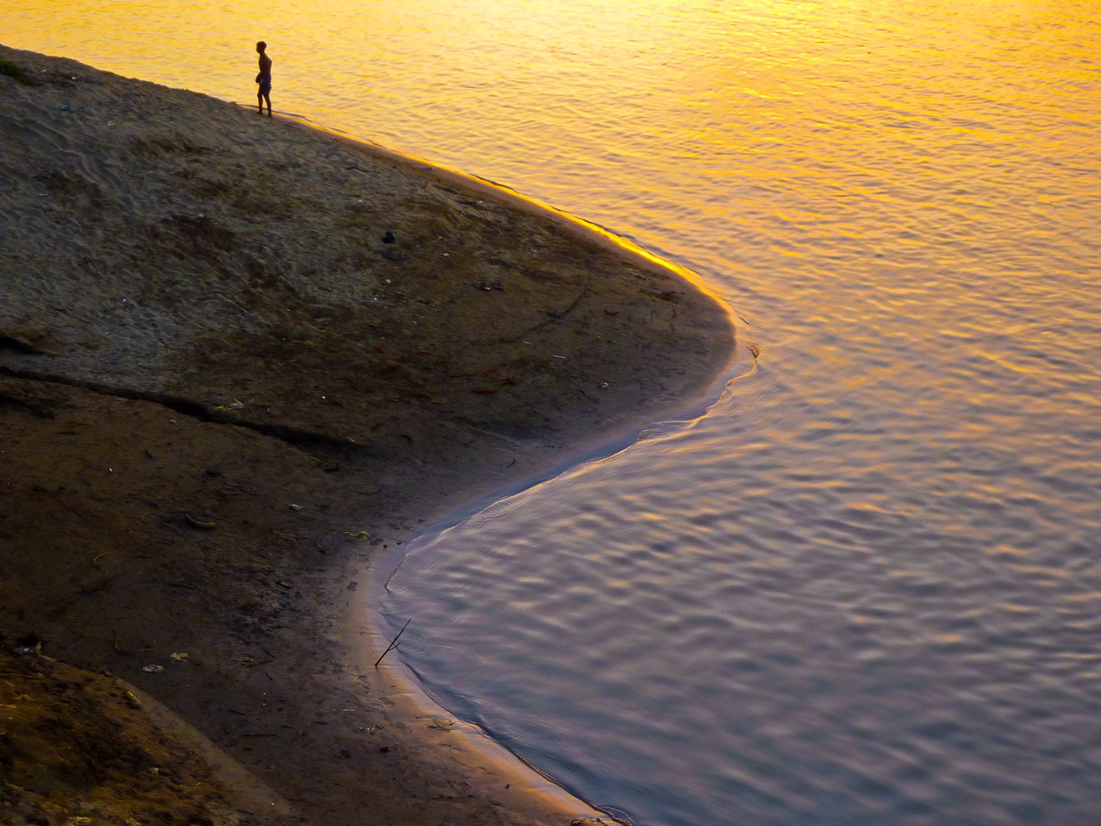 Climbing the riverside, Myanmar