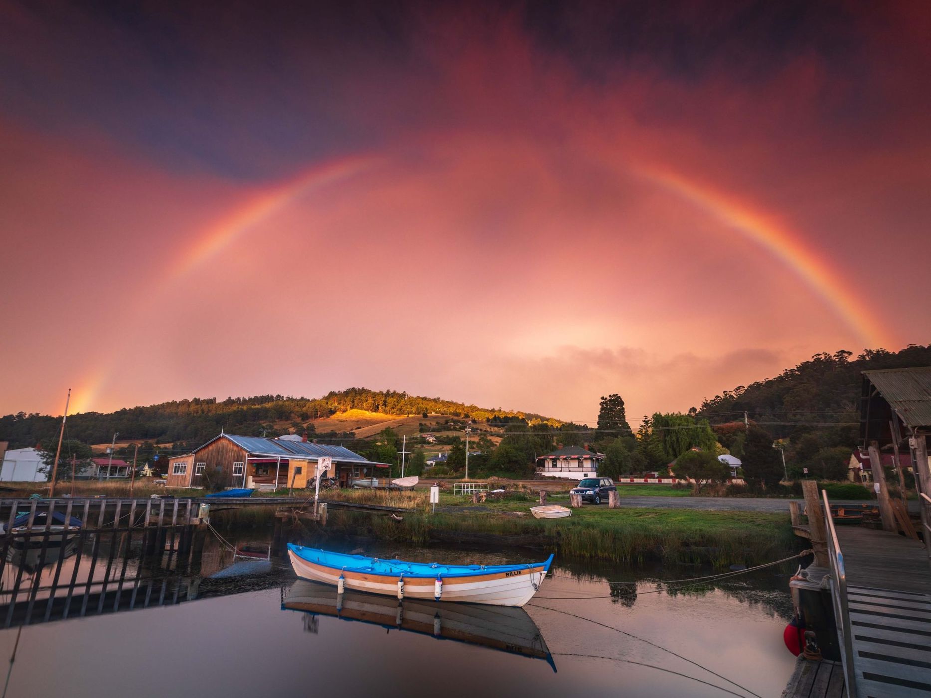Franklin small boat rainbow sunrise Tasmania, Australia