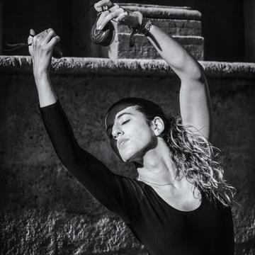 Dancer in front of Archivo General de Indias, Seville, Spain