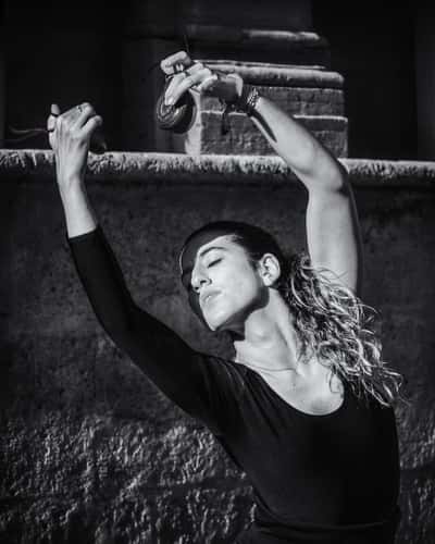 Dancer in front of Archivo General de Indias, Seville