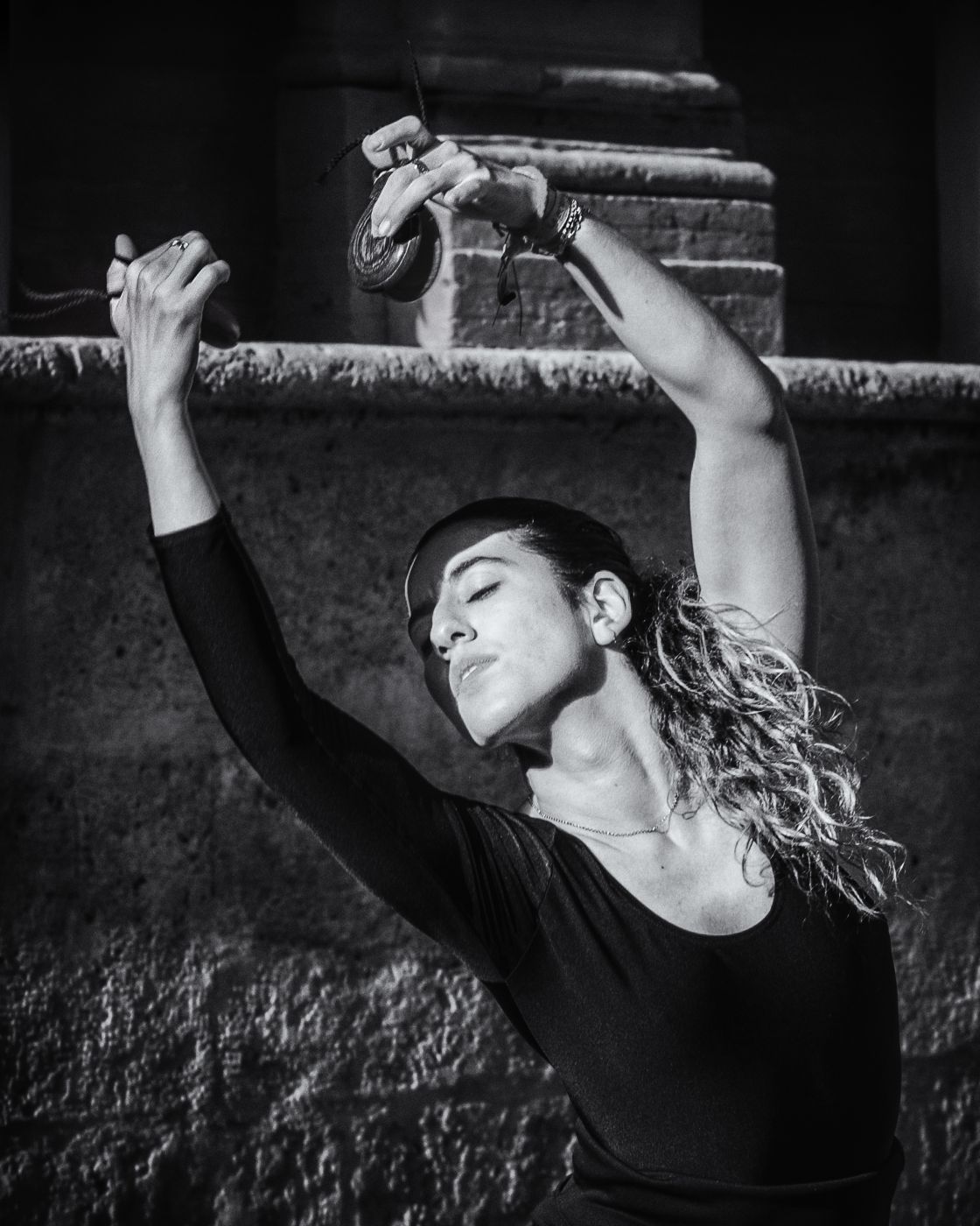 Dancer in front of Archivo General de Indias, Seville, Spain