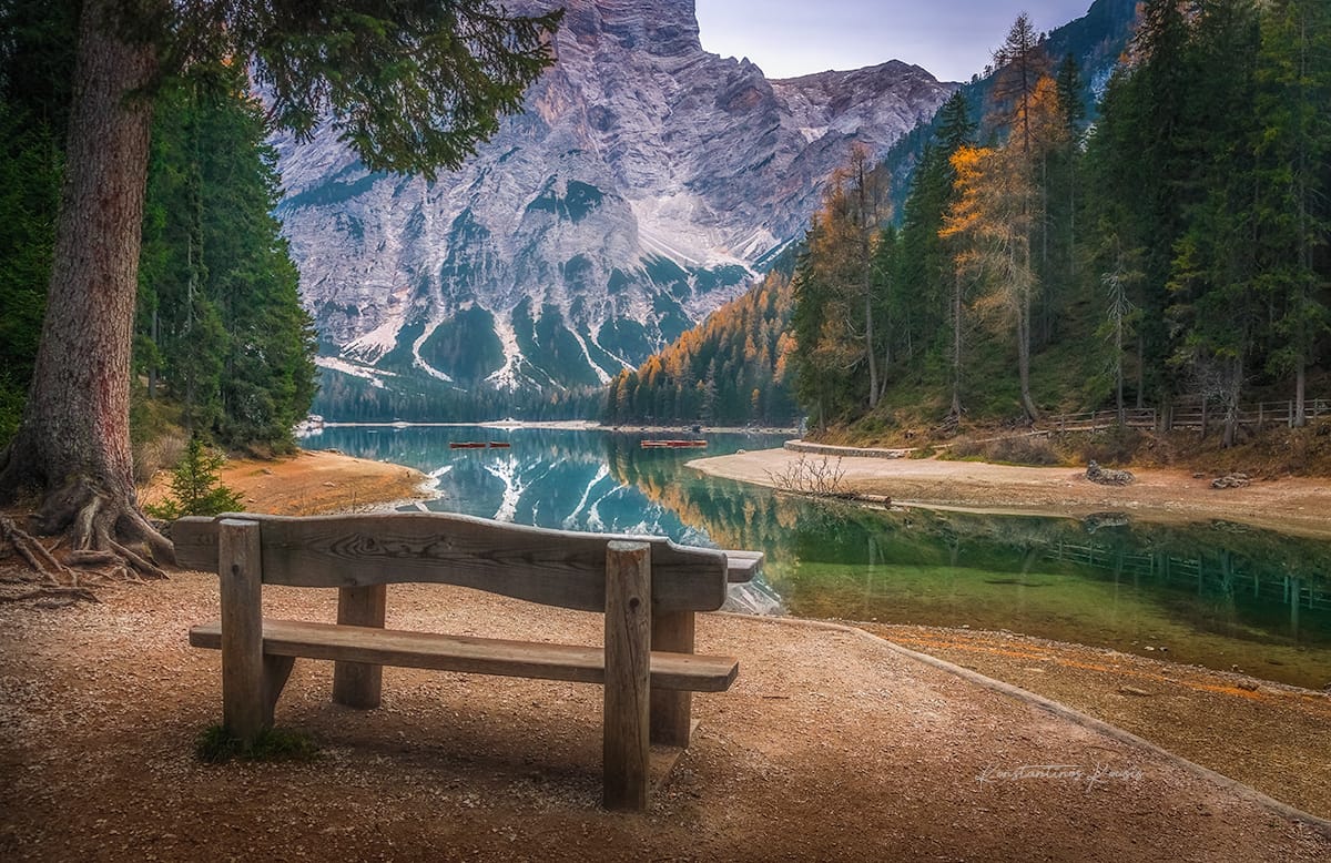 Boats in a bay of the Braies Lake, Dolomites, Italy