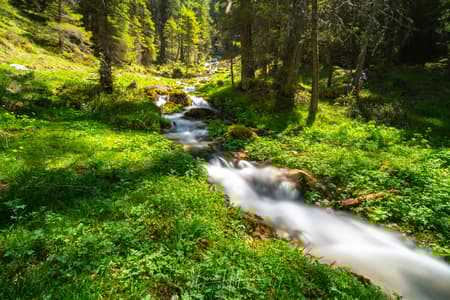 Chapel and waterfalls in Langental, Wolkenstein