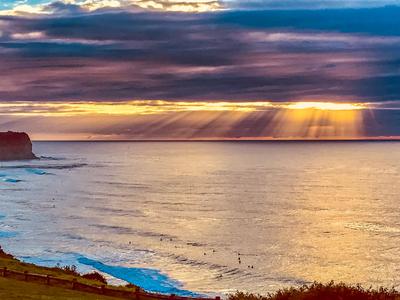 Early morning surf sunrise Warriwood Sydney