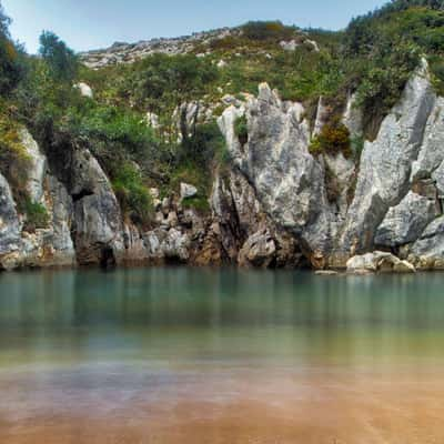 Playa de Gulpiyuri, Spain