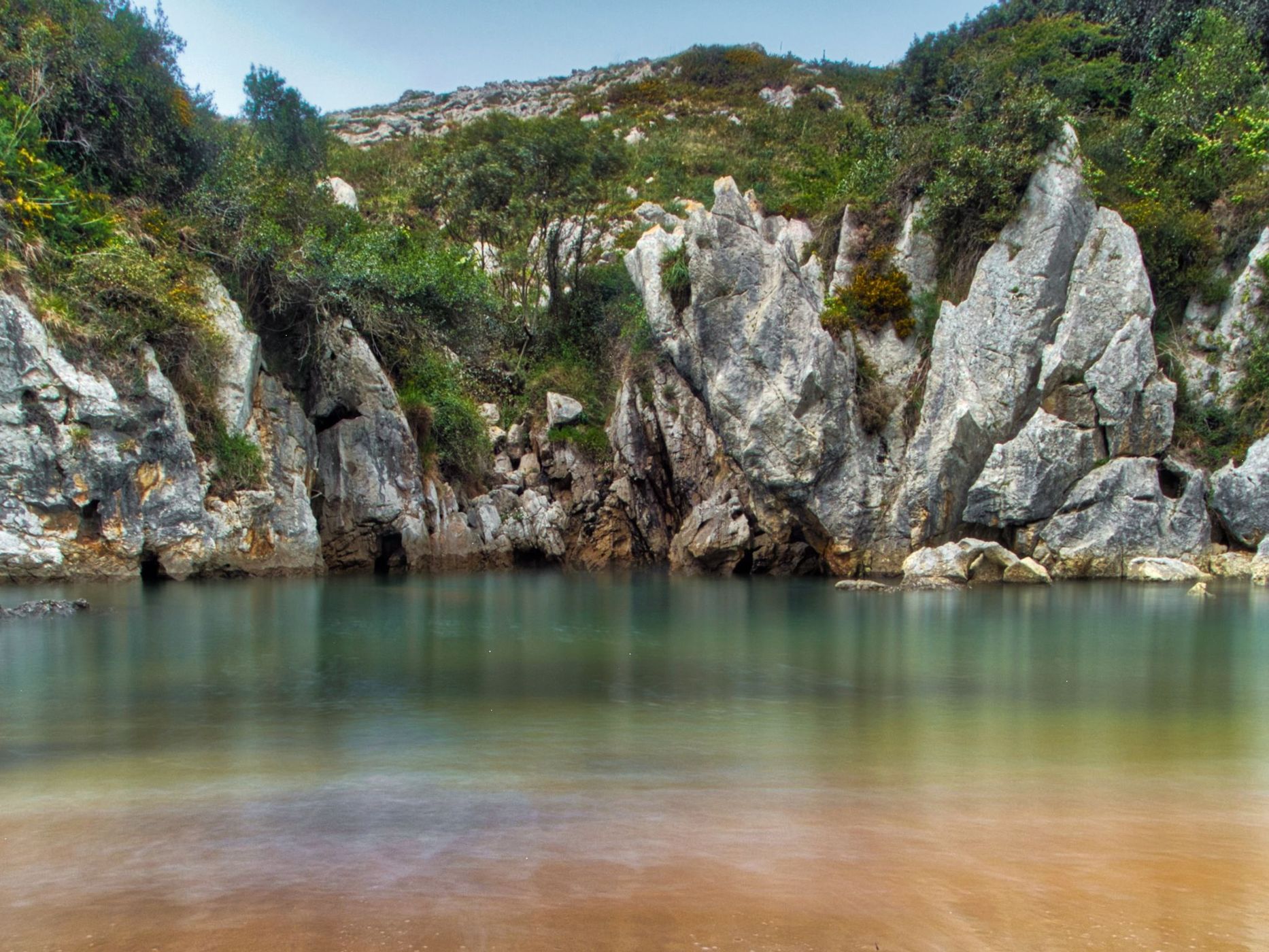 Playa de Gulpiyuri, Spain