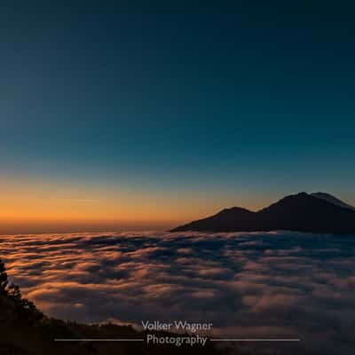 Sunrise above the clouds at Mount Batur, Indonesia