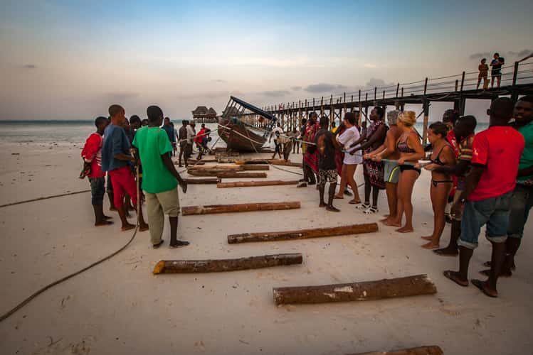Bringing in the boat Dongwe Zanzibar