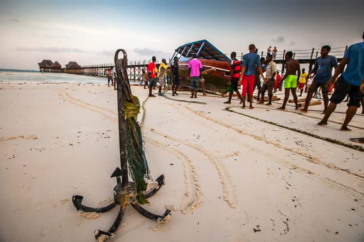 Bringing in the boat Dongwe Zanzibar