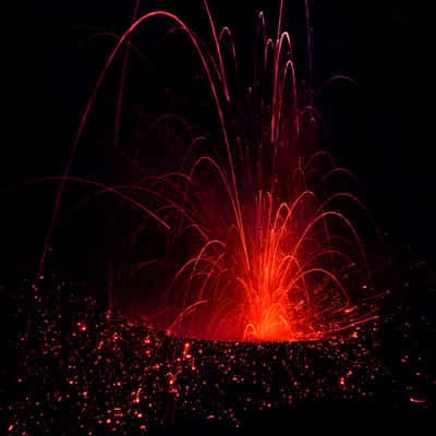 Dukono volcano at night and blue hour, Indonesia