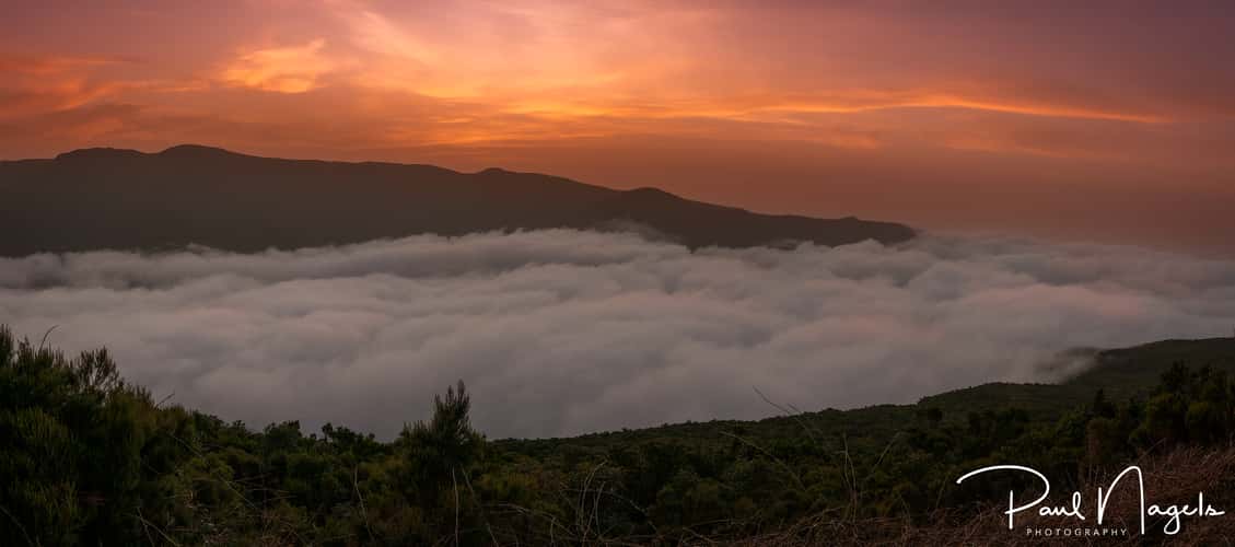 Sunset over the clouds.