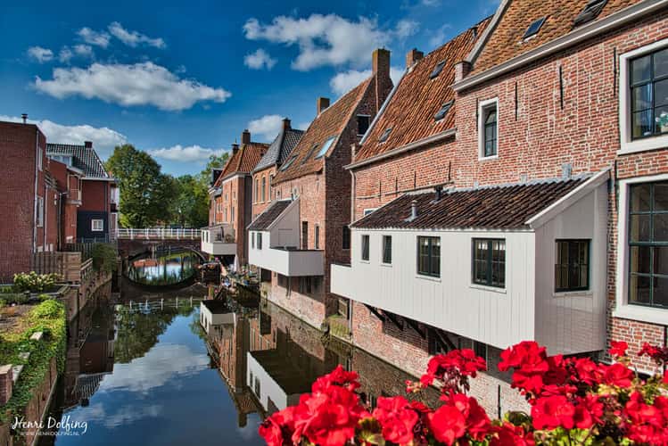 Hanging kitchens above Damsterdiep in city of Appingedam