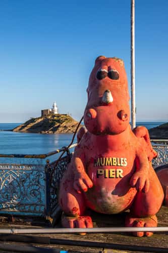 Mumbles pier dragon and lighthouse Wales