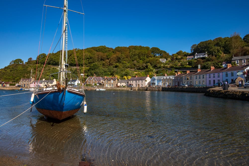 Sailing boat on the wharf Fishguard Wales, United Kingdom