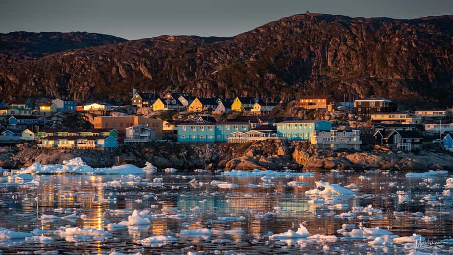 Ilulissat at sunrise from Disko bay