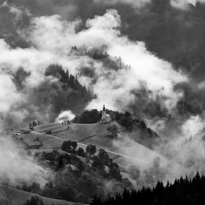 misty church of Zgornia Sorica, Slovenia