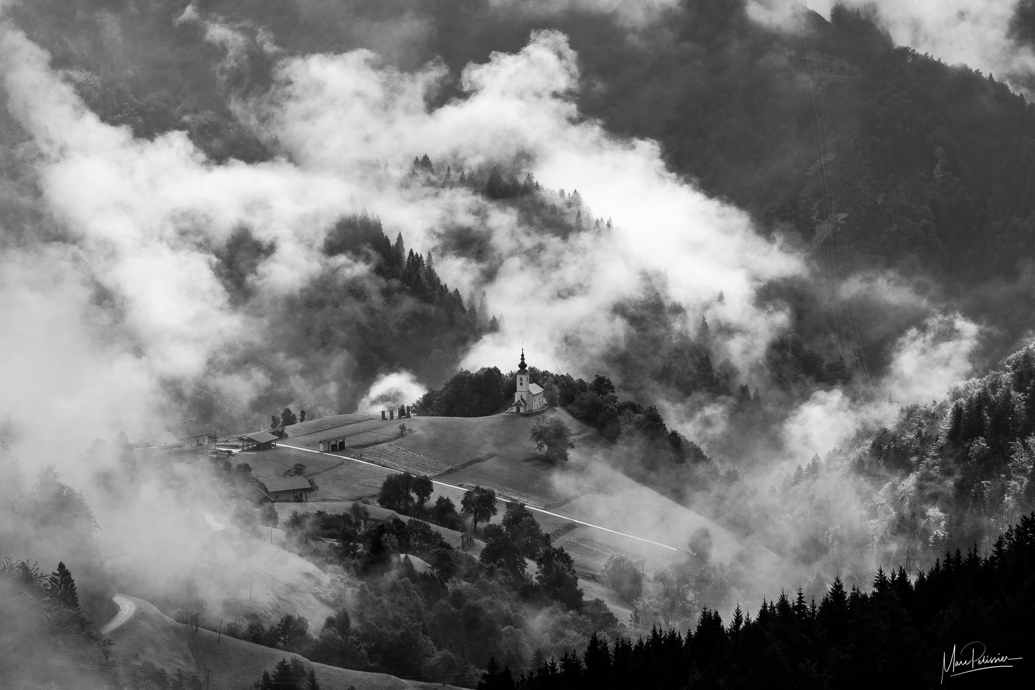 misty church of Zgornia Sorica, Slovenia