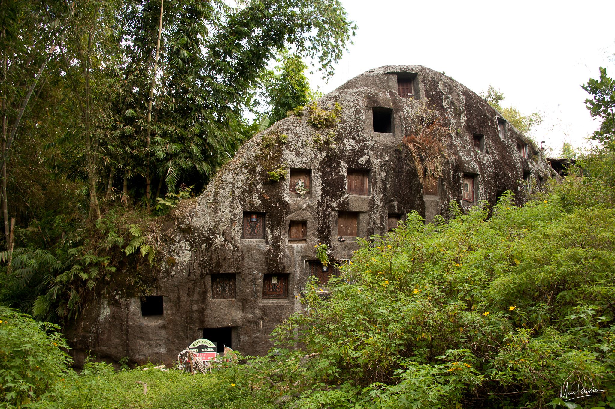 An ancient rock cemetery, hinting at spiritual significance and belief in the unseen.