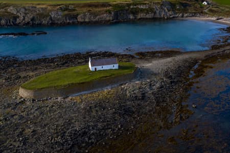 St Cwyfan's Church, Llangwyfan Wales [drone]