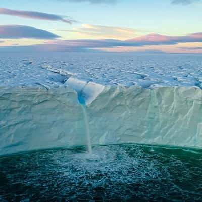 The icy blue waterfall at Austfonna, Svalbard & Jan Mayen Islands