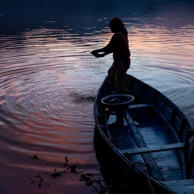 washing clothes at Pokhara lake, Nepal