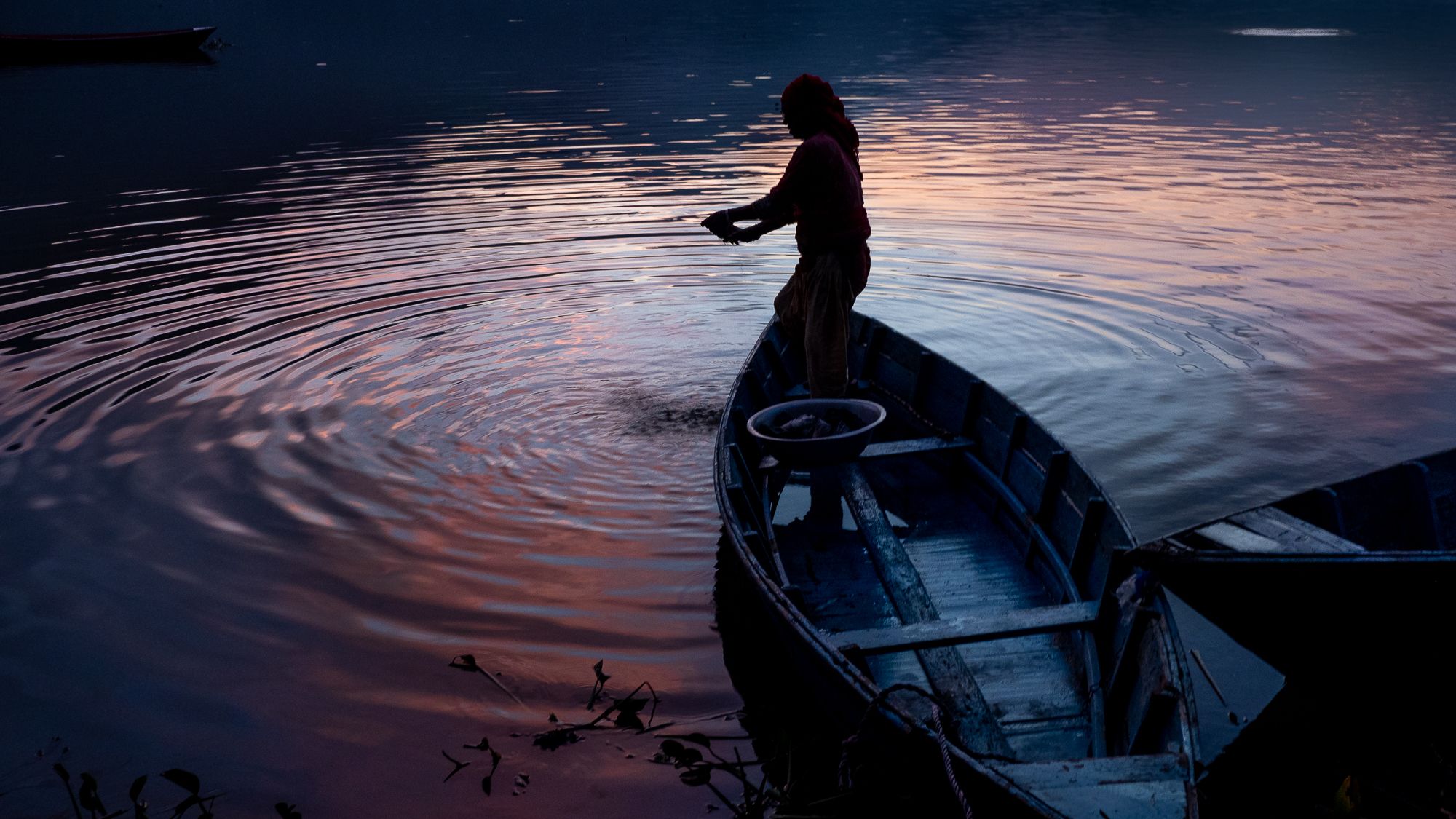 washing clothes at Pokhara lake, Nepal