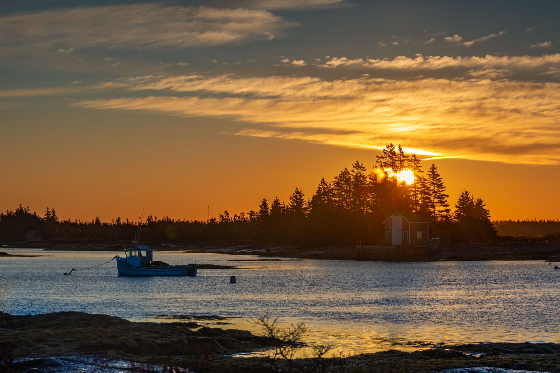 Blue Rocks sun and sunrise, Lunenburg, Nova Scotia, Canada