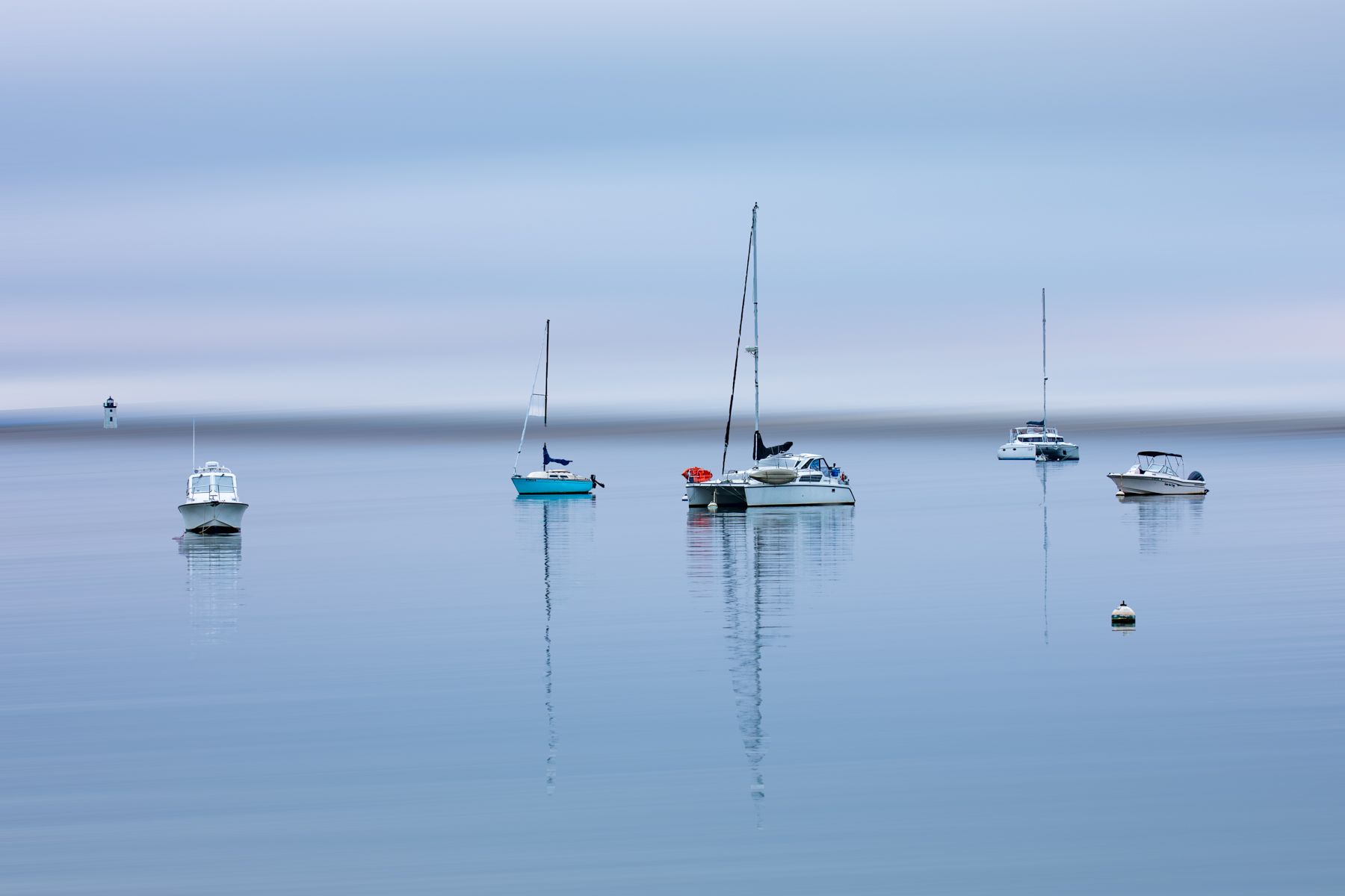 Boats & Lighthouse blur Provincetown, Cape Cod, USA