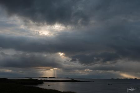 Cloudy sunset from Súgandisey Island Lighthouse