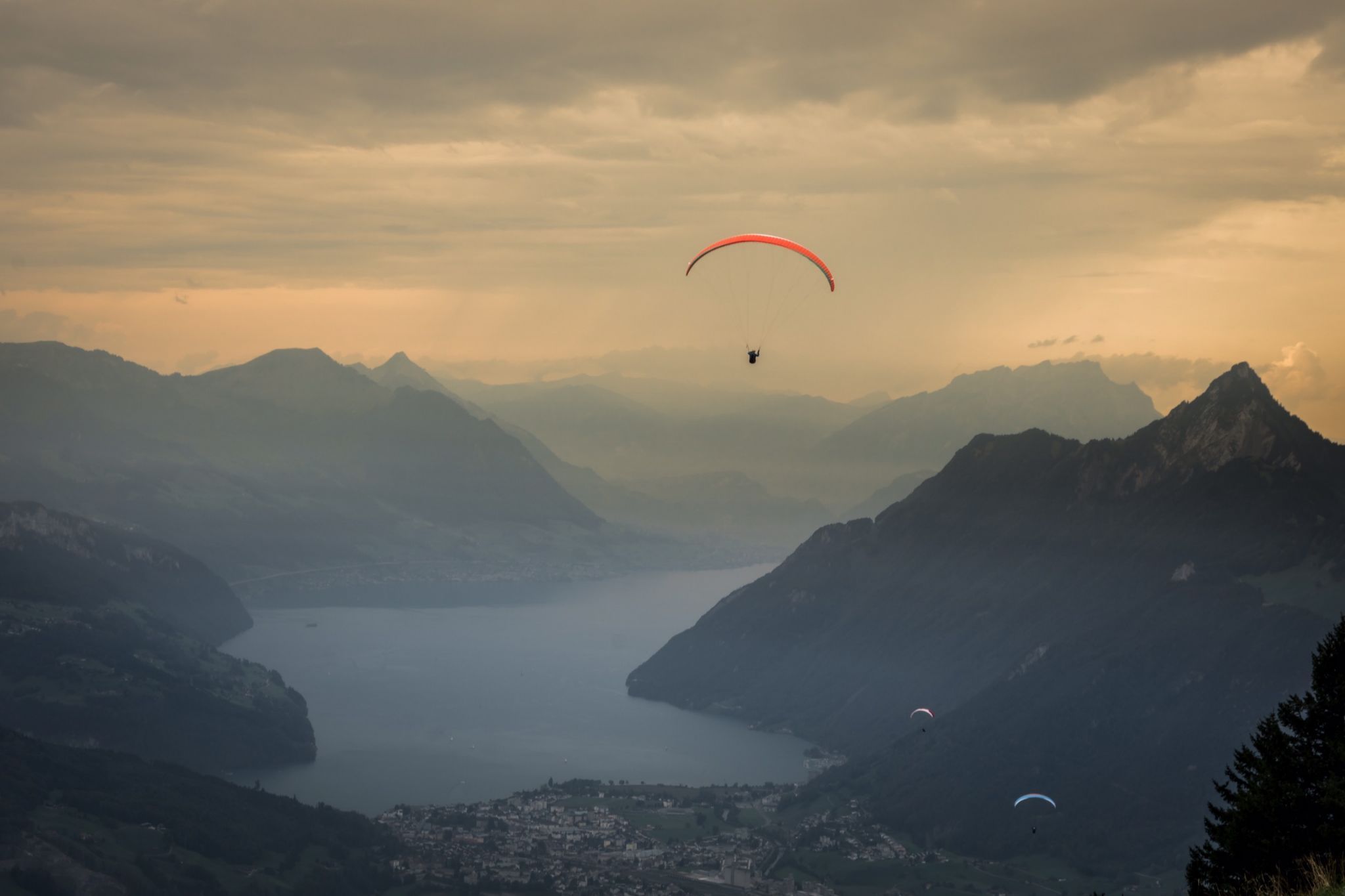 Paragliders above Lake Lucerne, Switzerland