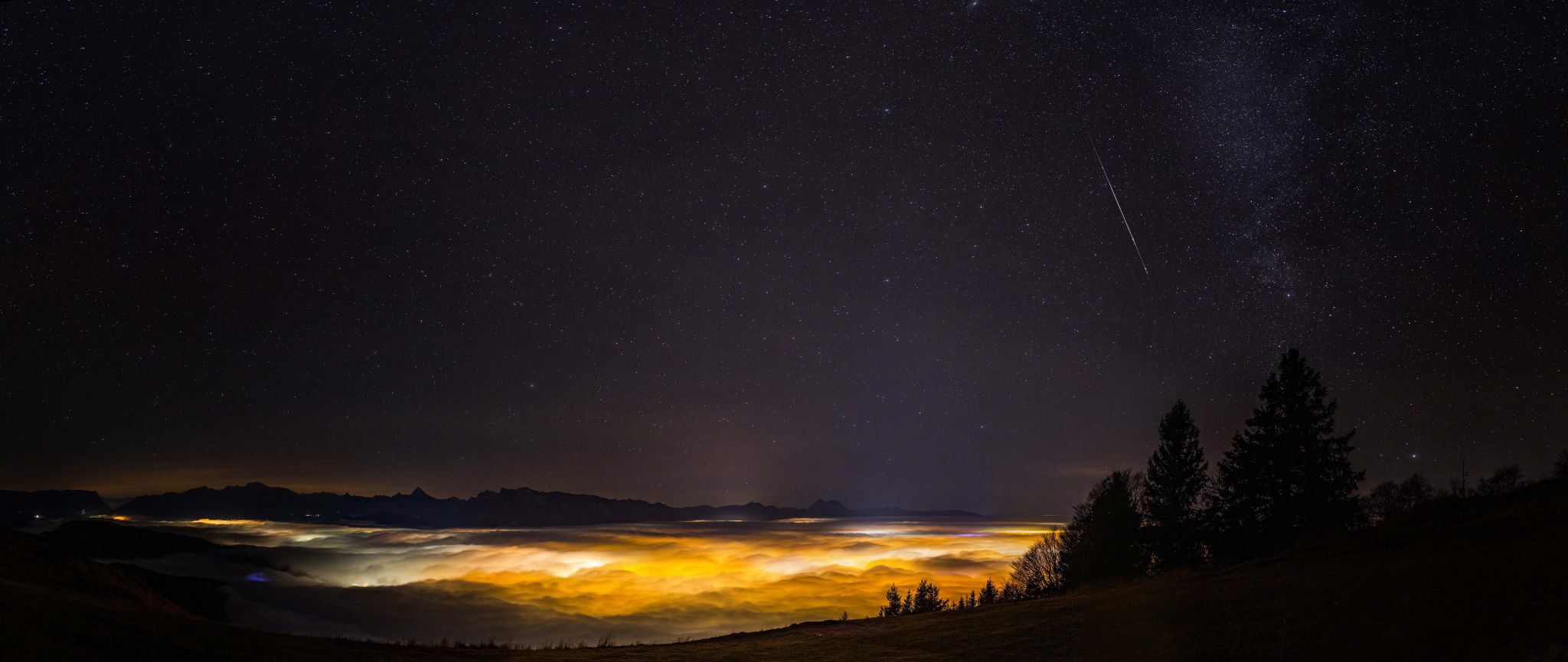 Salzburg at night, covered by fog, Austria