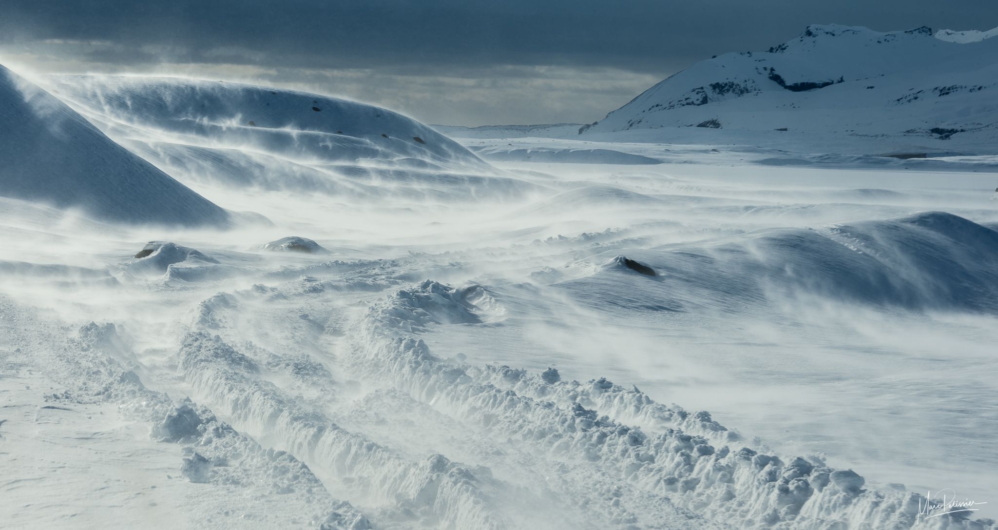 Snow tracks to Ice cave, Iceland