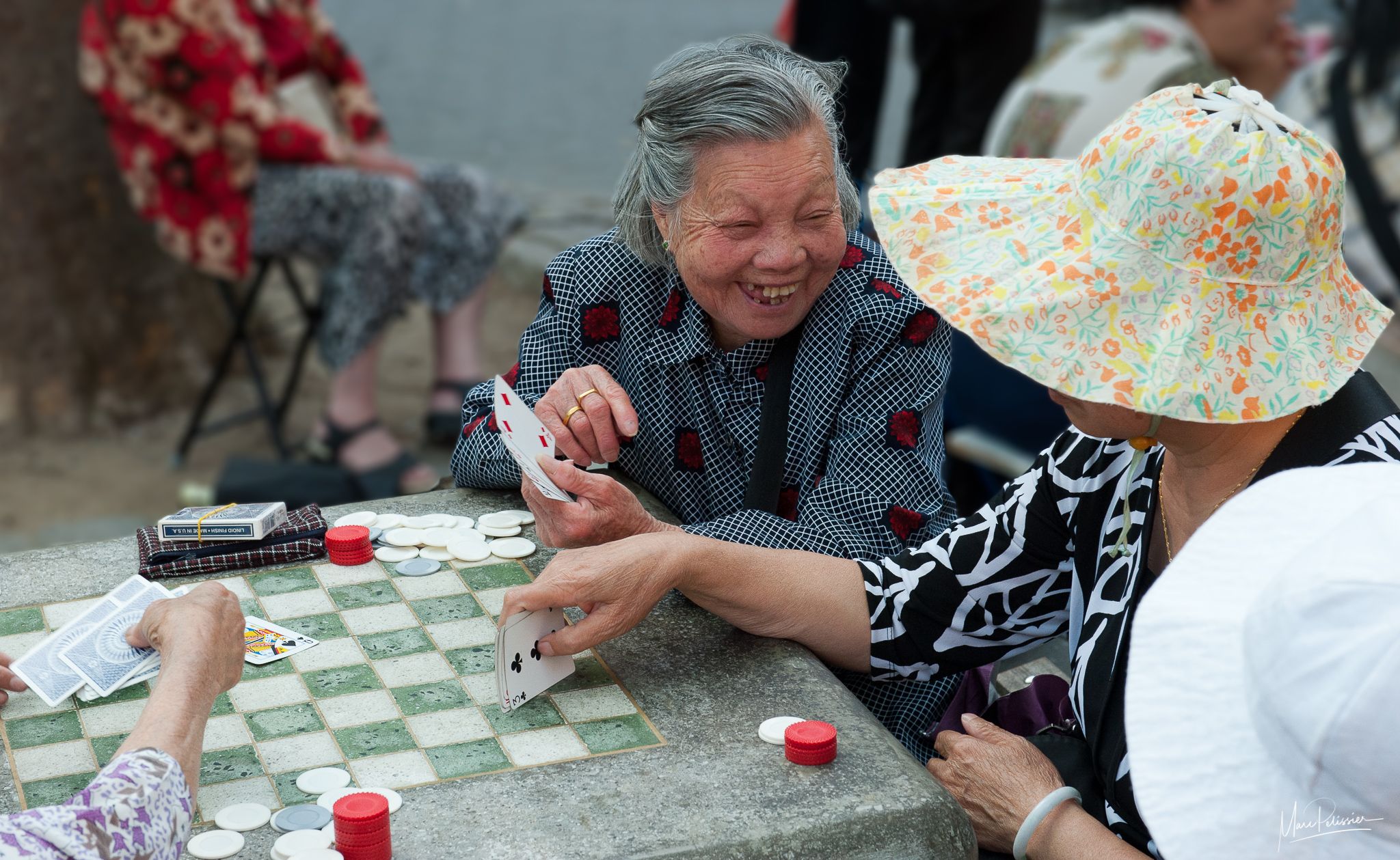 Sunday card play in Colombus park, USA