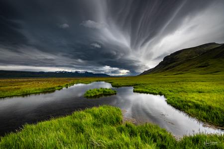 The stormy pond, Seljalandsfoss