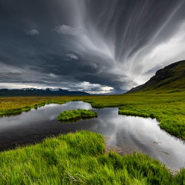 The stormy pond, Seljalandsfoss, Iceland