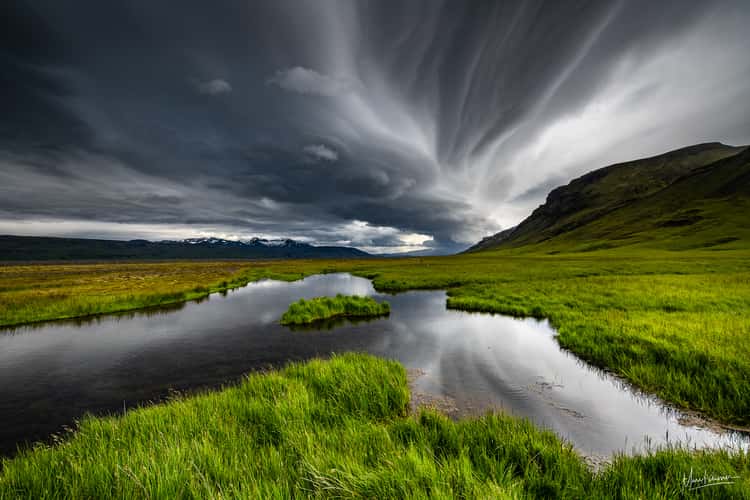 The stormy pond, Seljalandsfoss