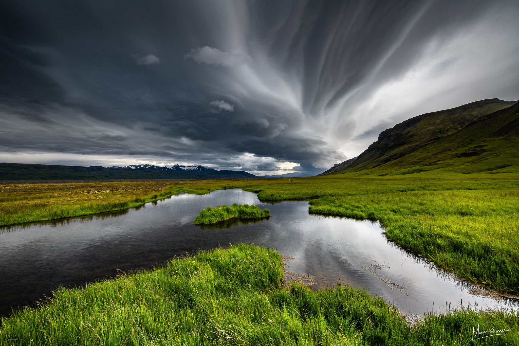 The stormy pond, Seljalandsfoss, Iceland