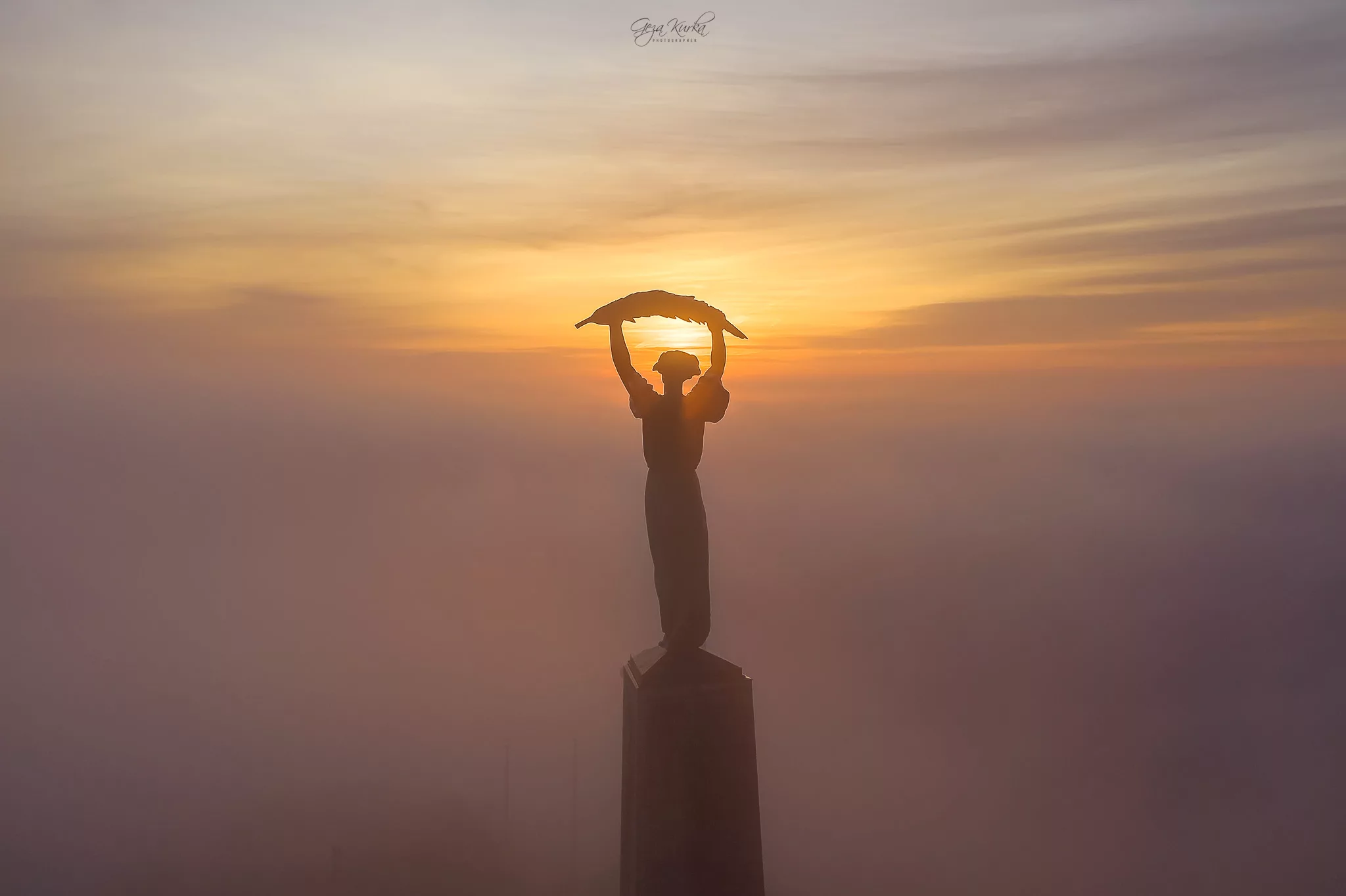 Foggy mornig in Budapest, Citadella, Liberty statue, Hungary
