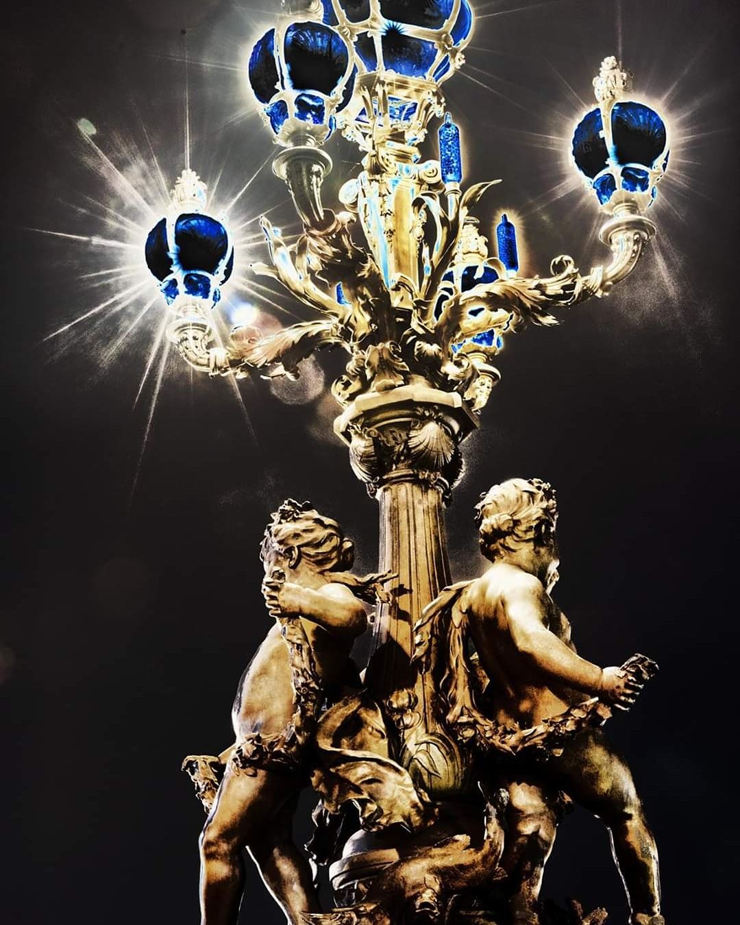 Paris at Night from Pont Alexandre III, France